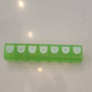 Free With Purchase Green Weekly Pill Organizer